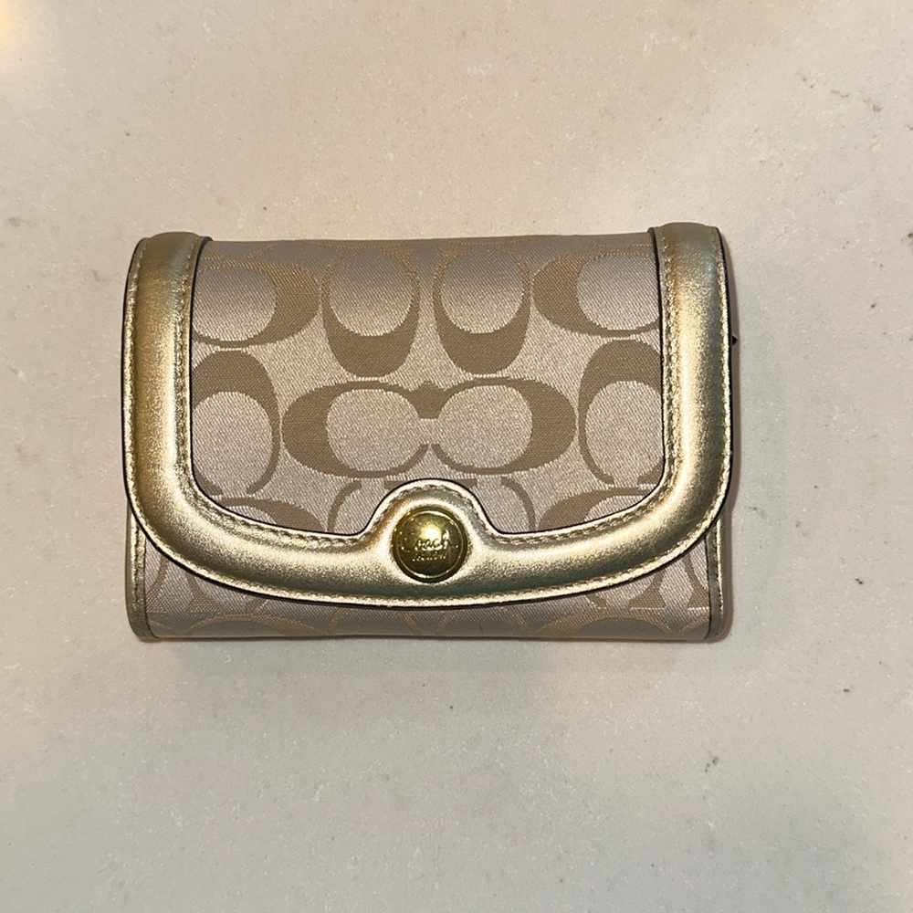 Coach branded gold wallet